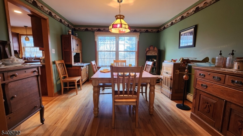 136 Route560 Layton, NJ 07851 - Photo 12 of 50 a view of a dining room with furniture window and wooden floor