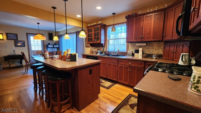136 Route560 Layton, NJ 07851 - Photo 18 of 50 a kitchen with a sink appliances and cabinets
