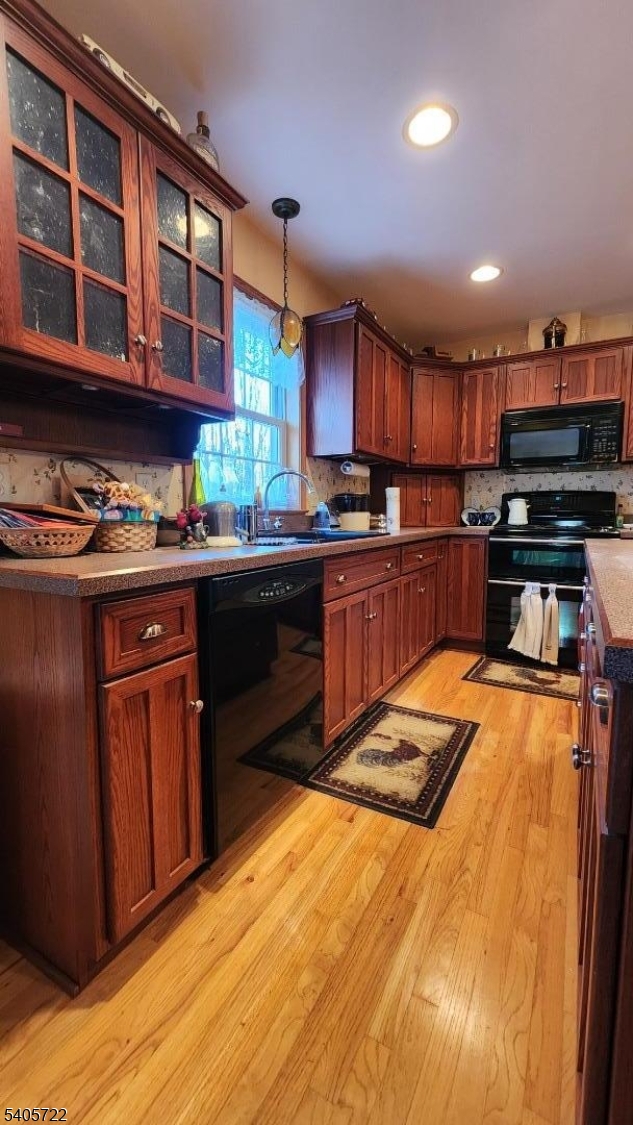 136 Route560 Layton, NJ 07851 - Photo 21 of 50 a kitchen with stainless steel appliances granite countertop a stove sink and cabinets