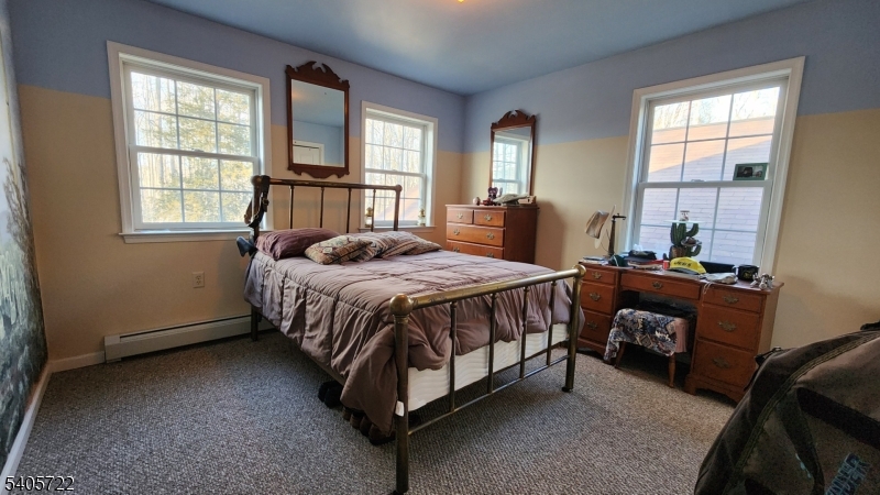 136 Route560 Layton, NJ 07851 - Photo 37 of 50 a bedroom with a bed and a window