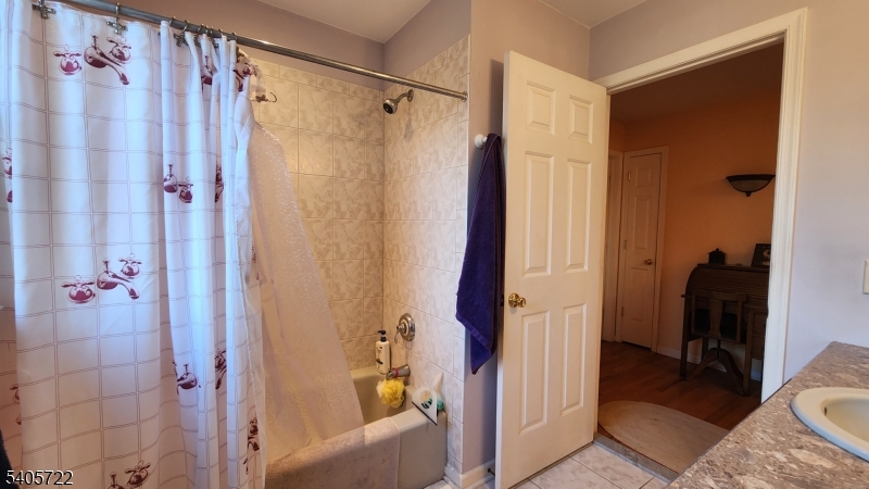 136 Route560 Layton, NJ 07851 - Photo 43 of 50 a bathroom with a shower and a tub