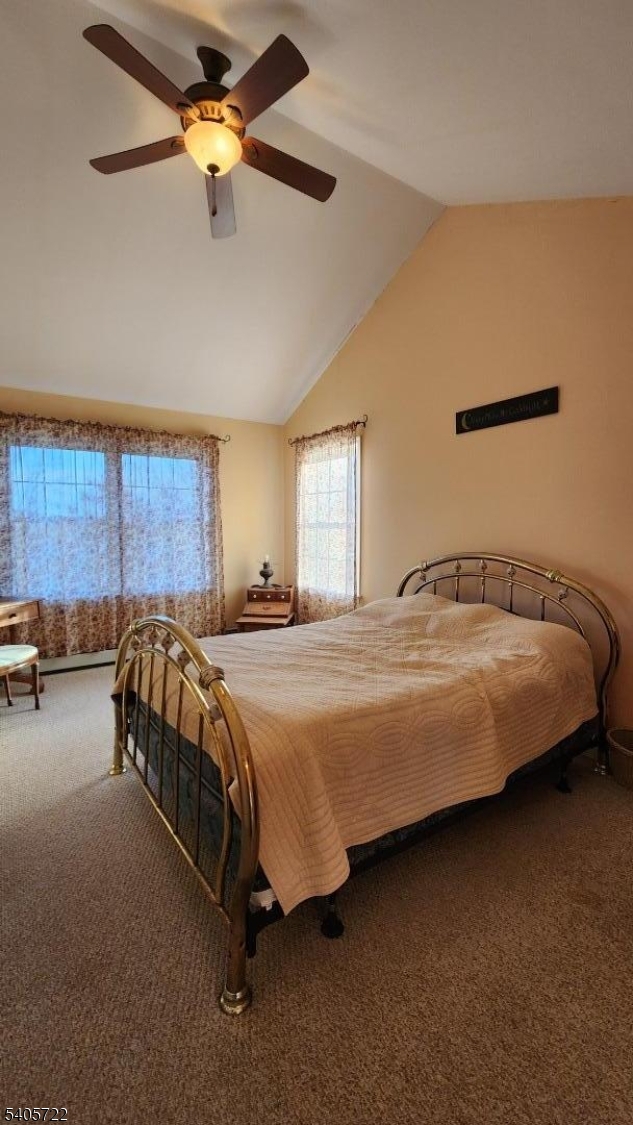 136 Route560 Layton, NJ 07851 - Photo 47 of 50 a bedroom with a bed and a chandelier