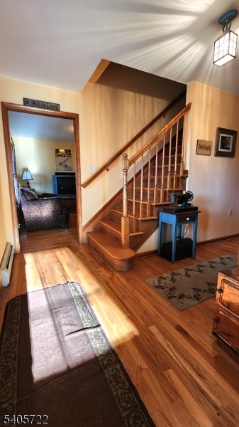 136 Route560 Layton, NJ 07851 - Photo 9 of 50 a view of entryway and hall with wooden floor