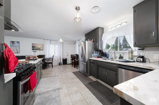 a kitchen with sink cabinets and counter top space