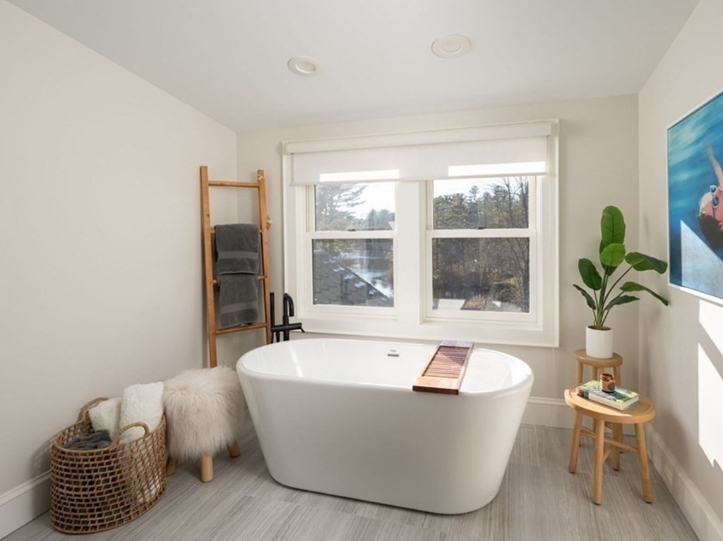 25 Mill Lane Hingham, MA 02043 - Photo 17 of 26 a living room with furniture and a window