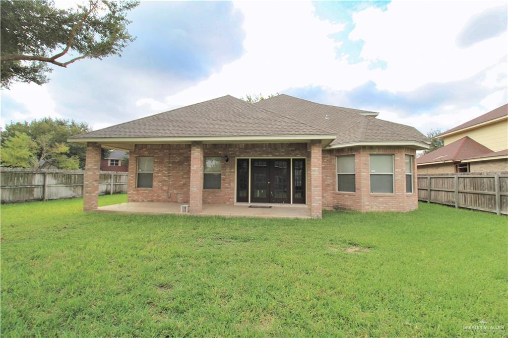 8202 North 22nd Lane McAllen, TX 78504 - Photo 25 of 25 front view of a house with a garden