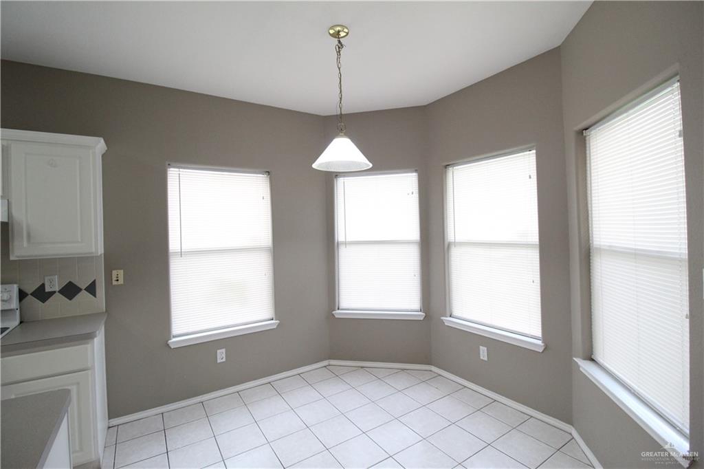 8202 North 22nd Lane McAllen, TX 78504 - Photo 8 of 25 a view of an empty room with a window