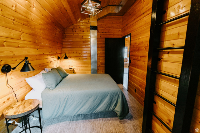 1413 Basel Drive Midway, UT 84049 - Photo 64 of 137 Bedroom featuring wood walls and lofted ceiling
