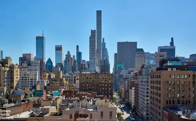a view of a balcony with city view
