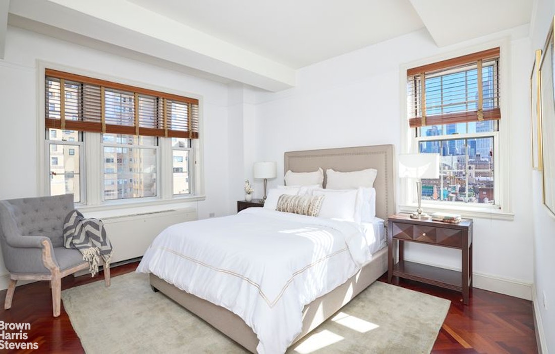 841 Madison Avenue, Unit 11/12 Manhattan, NY 10021 - Photo 14 of 19 a bedroom with a large bed and a window