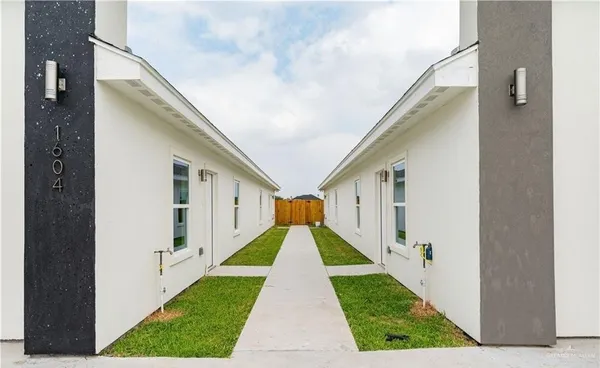 a view of balcony with yard