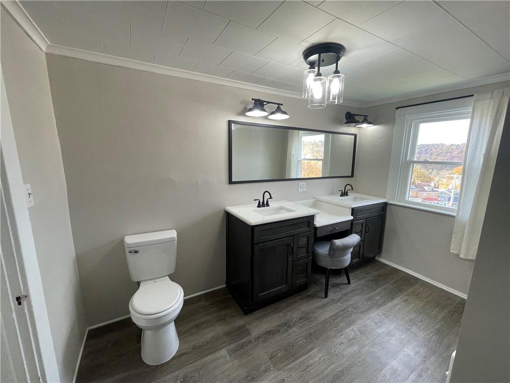 624 4th Street Monongahela, PA 15063 - Photo 20 of 29 a spacious bathroom with a toilet sink and mirror