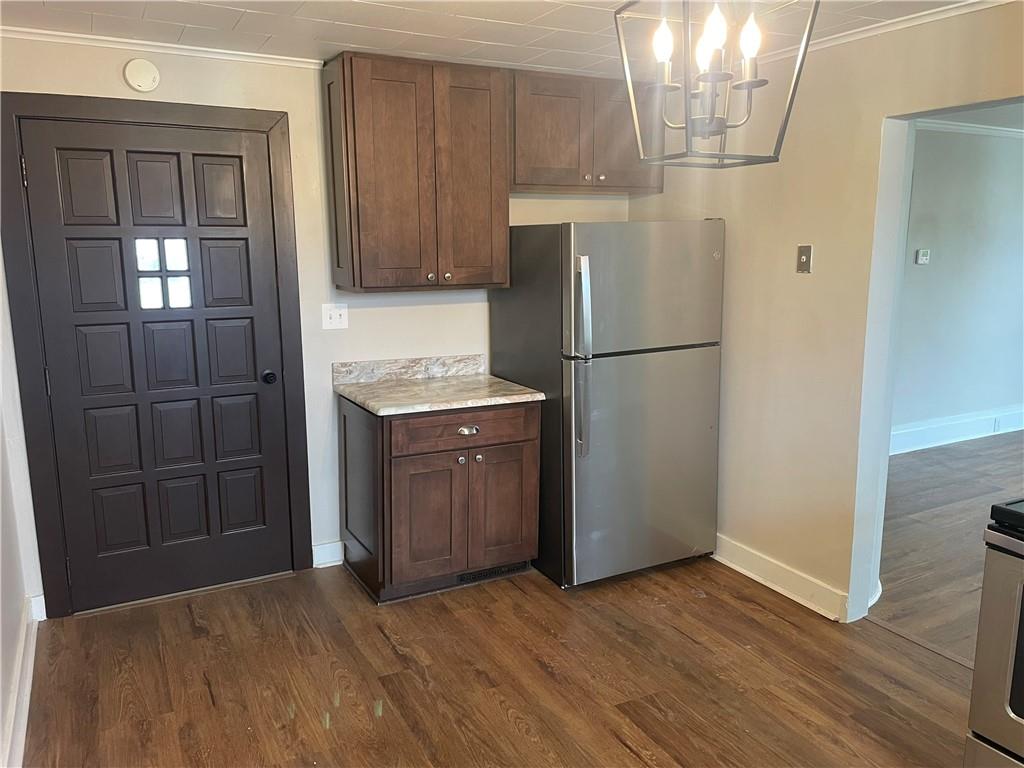 624 4th Street Monongahela, PA 15063 - Photo 10 of 29 a kitchen with stainless steel appliances a refrigerator and a wooden floor