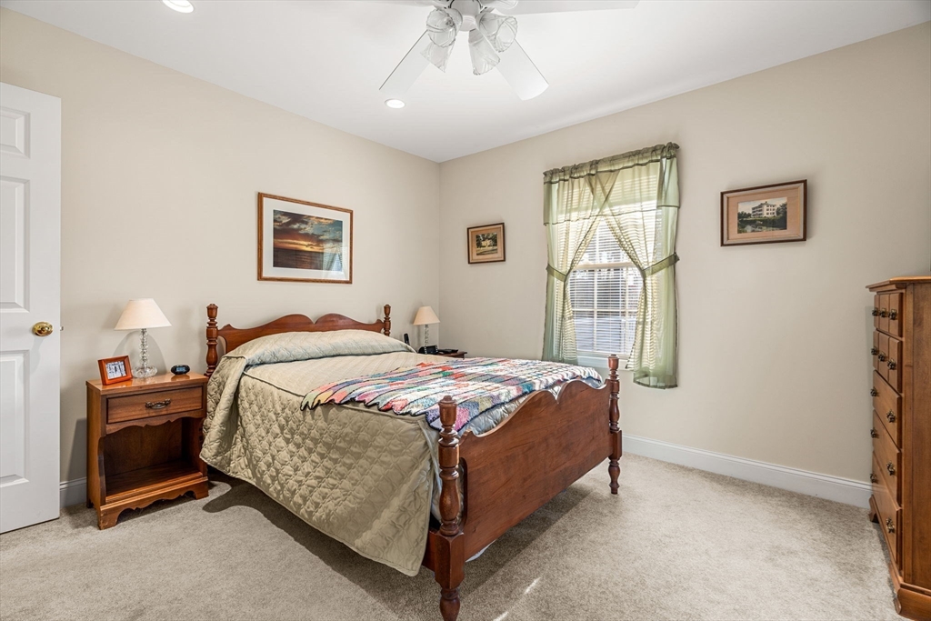 28 Van Norden Road Woburn, MA 01801 - Photo 14 of 24 a bedroom with a bed and a window