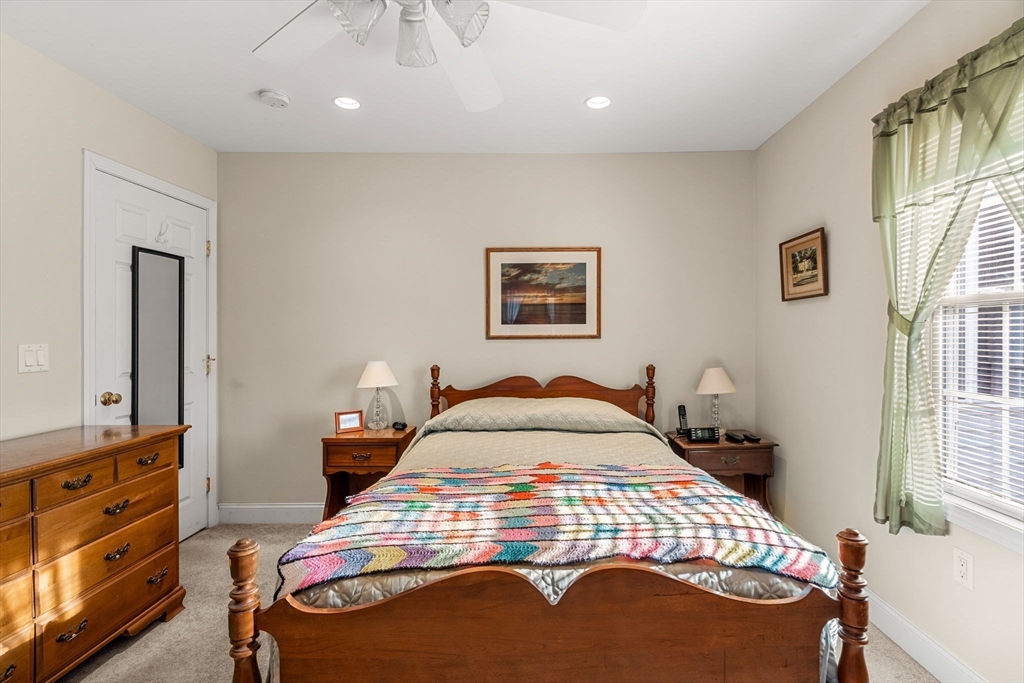 28 Van Norden Road Woburn, MA 01801 - Photo 15 of 24 a bedroom with a bed and a dresser