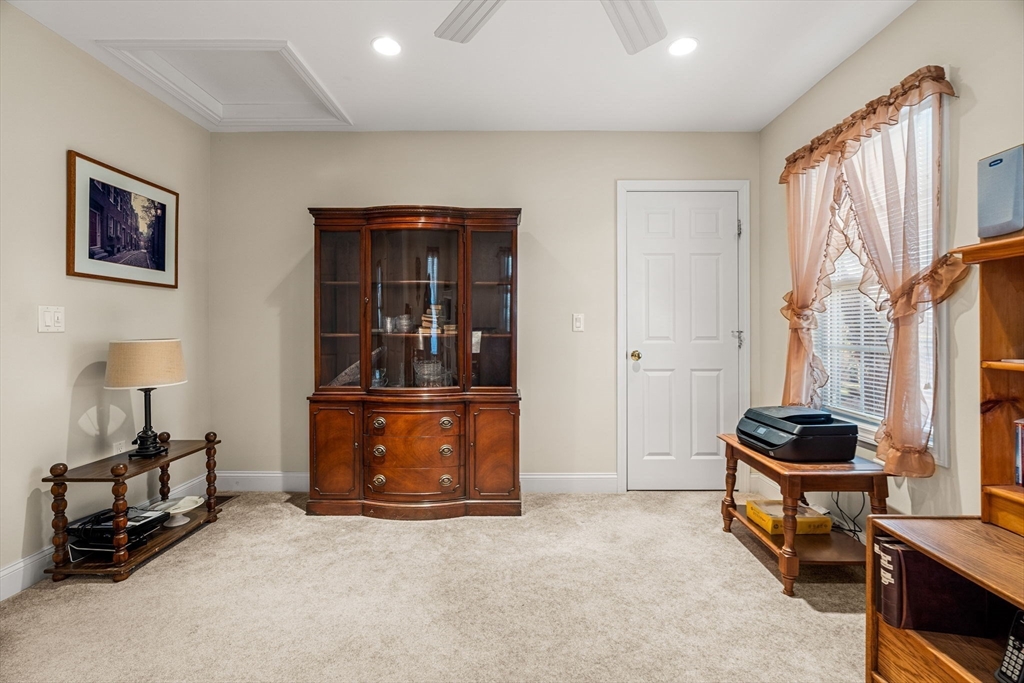 28 Van Norden Road Woburn, MA 01801 - Photo 17 of 24 a room with furniture and natural light