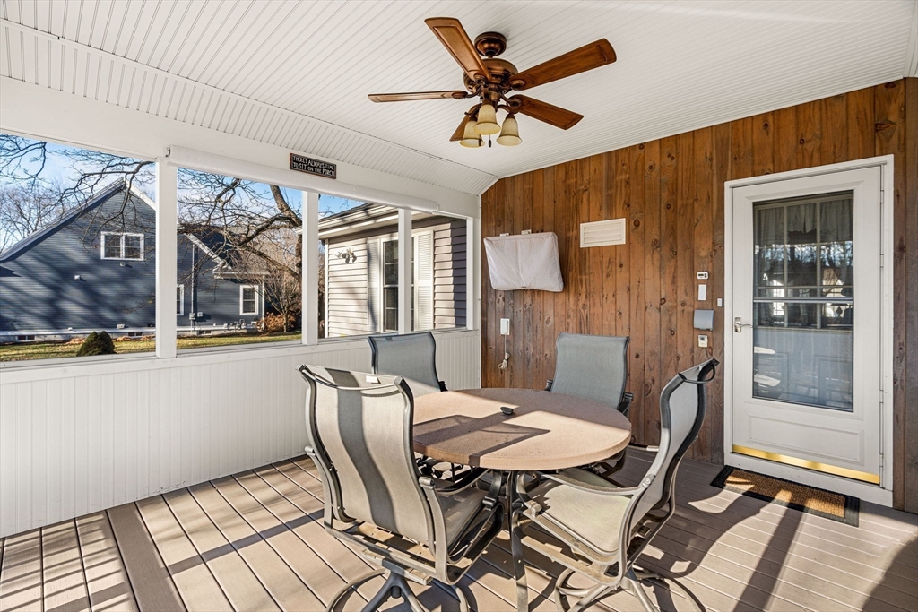 28 Van Norden Road Woburn, MA 01801 - Photo 20 of 24 a view of a dining room with furniture window and wooden floor