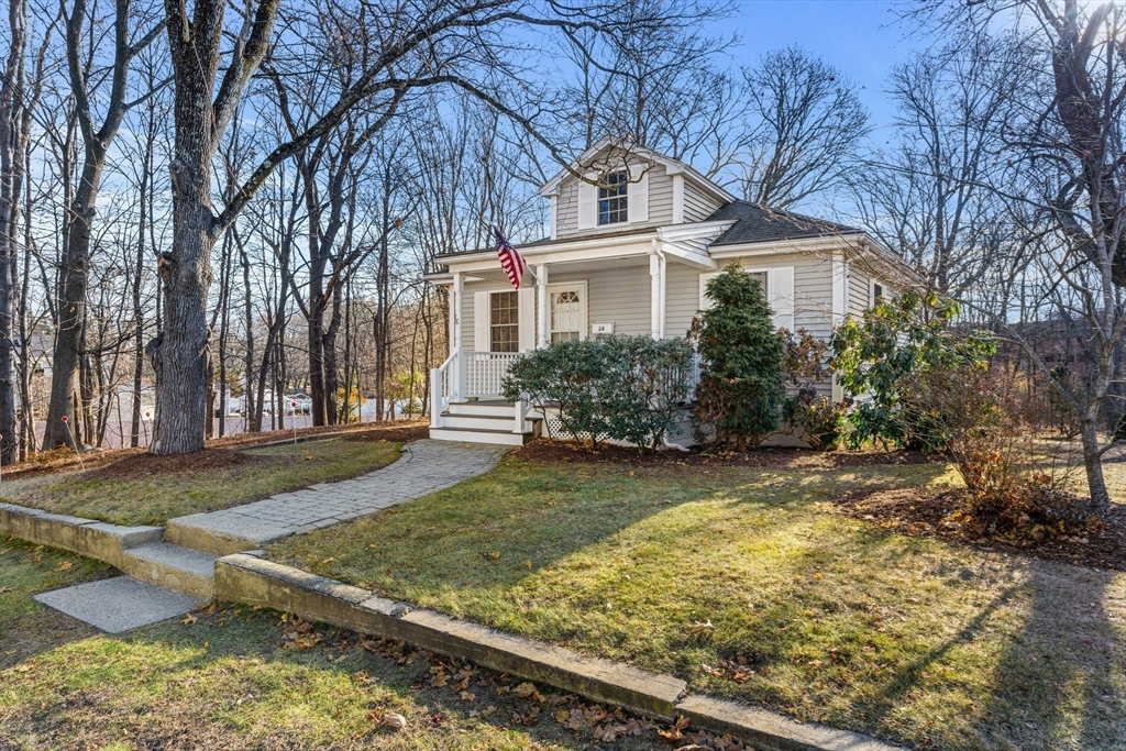 28 Van Norden Road Woburn, MA 01801 - Photo 2 of 24 a front view of a house with garden