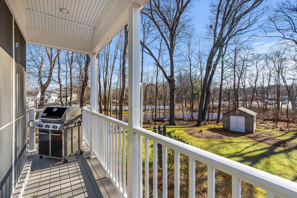 28 Van Norden Road Woburn, MA 01801 - Photo 23 of 24 a view of a two chairs in the balcony