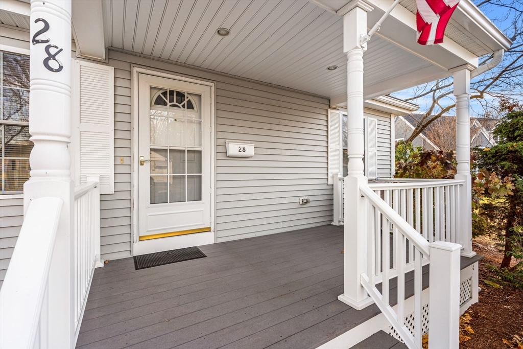 28 Van Norden Road Woburn, MA 01801 - Photo 24 of 24 a view of staircase with white walls and windows