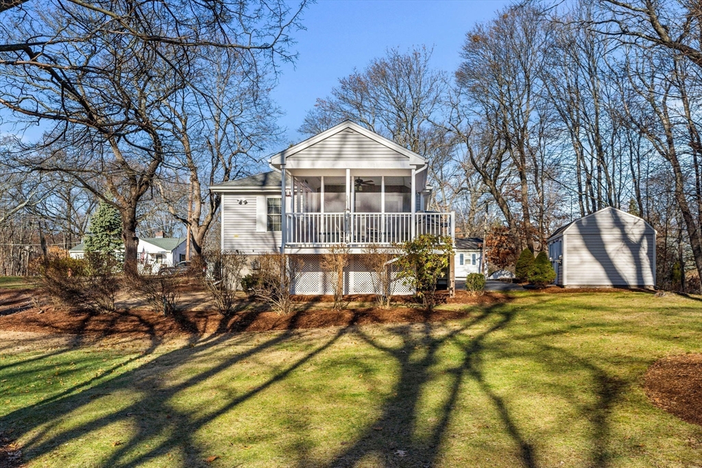 28 Van Norden Road Woburn, MA 01801 - Photo 5 of 24 a view of a house with yard and sitting area