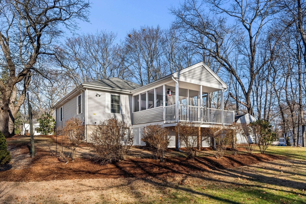 28 Van Norden Road Woburn, MA 01801 - Photo 6 of 24 a front view of a house with a yard
