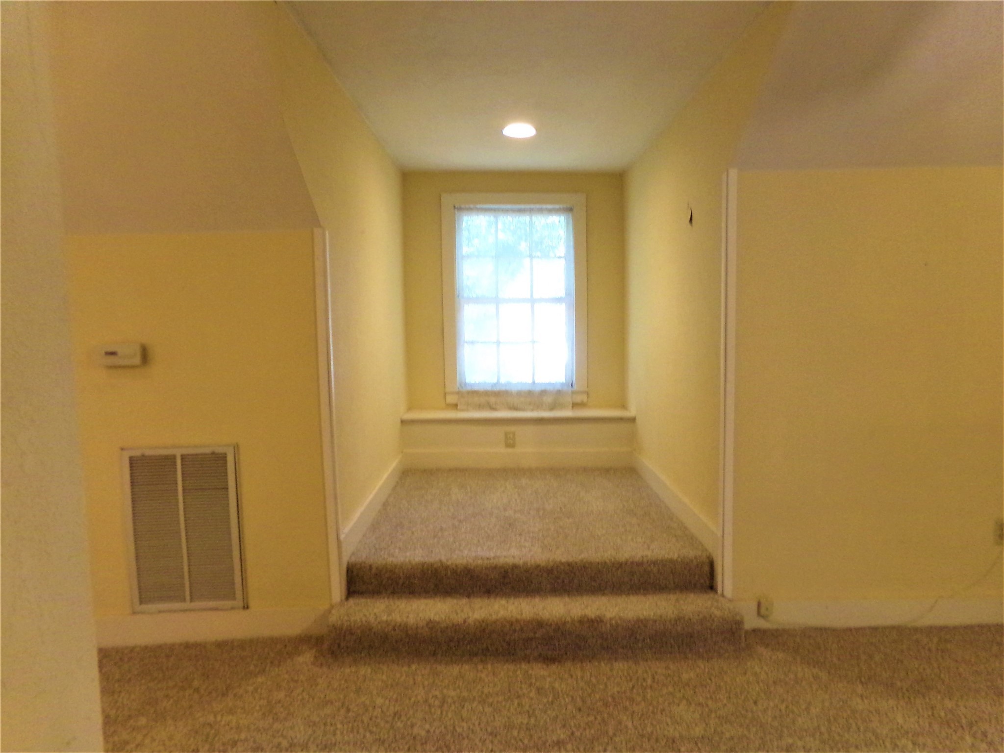300 South Summit Street Weimar, TX 78962 - Photo 25 of 27 a view of entryway with wooden floor
