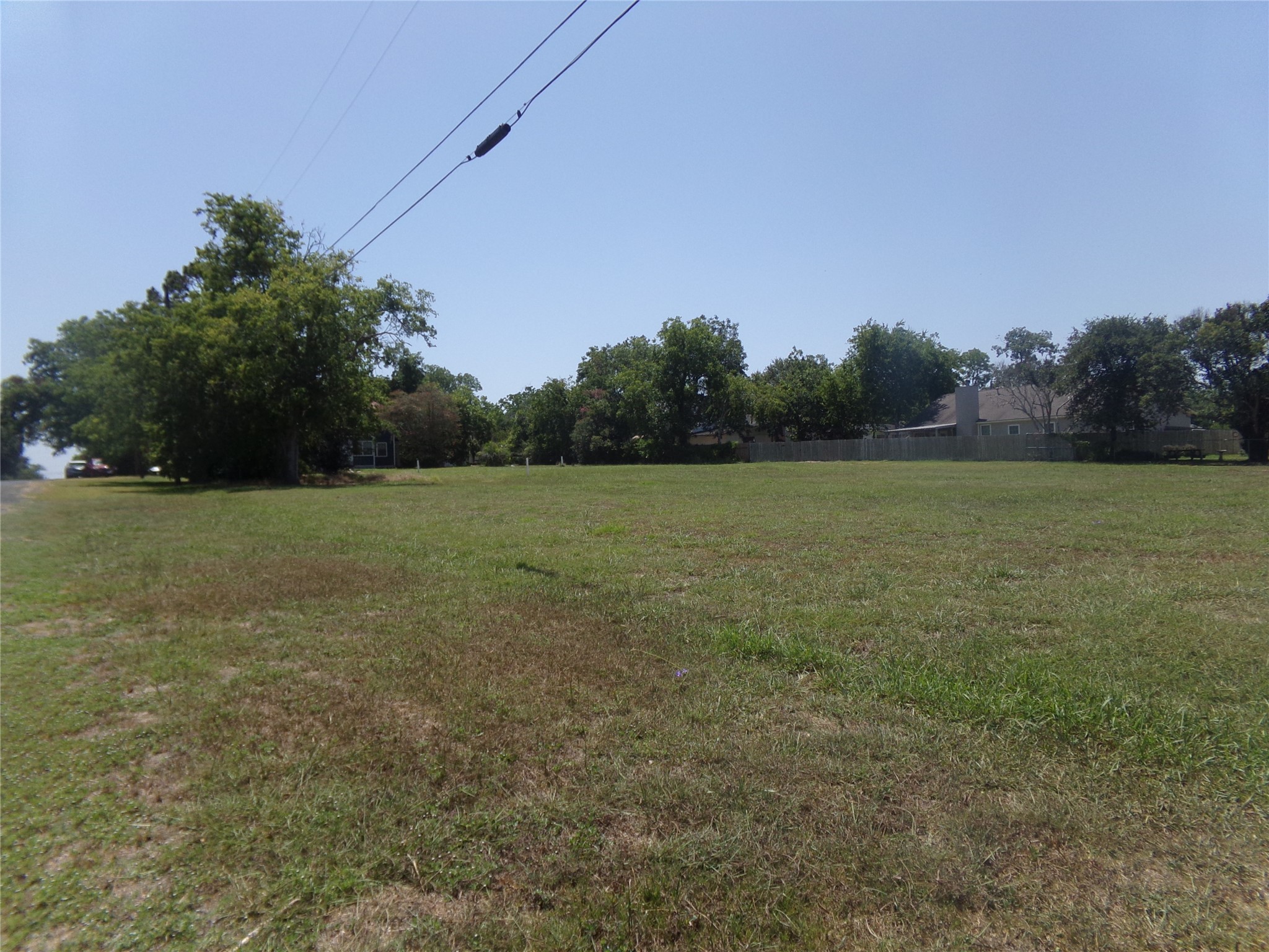 300 South Summit Street Weimar, TX 78962 - Photo 27 of 27 a view of a field with trees in background