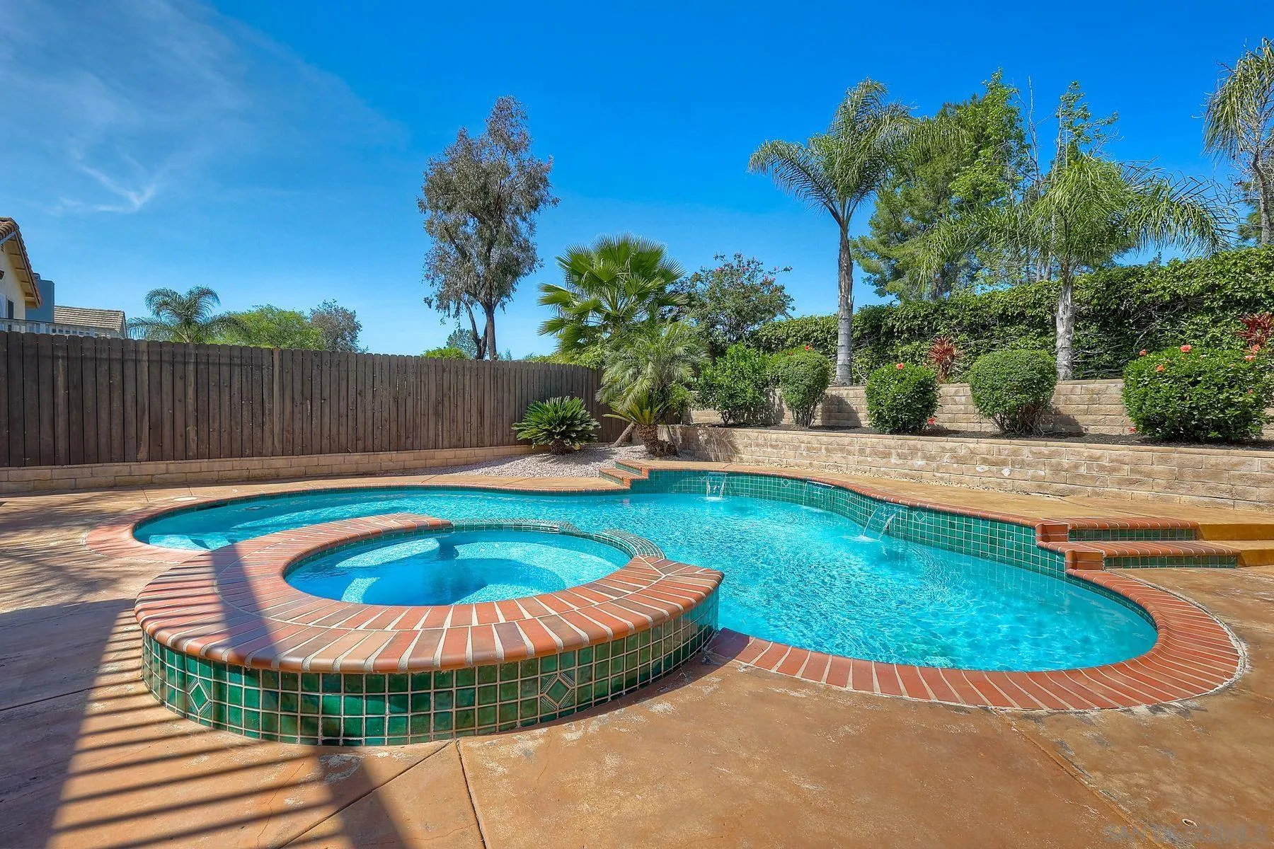 13976 Country Creek Road Poway, CA 92064 - Photo 34 of 40 a view of a swimming pool with a yard