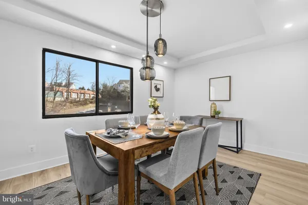 a bedroom with a large bed and a large window