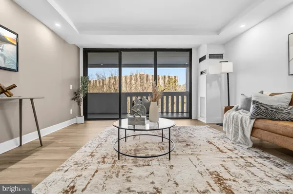 a bedroom with a bed and a table