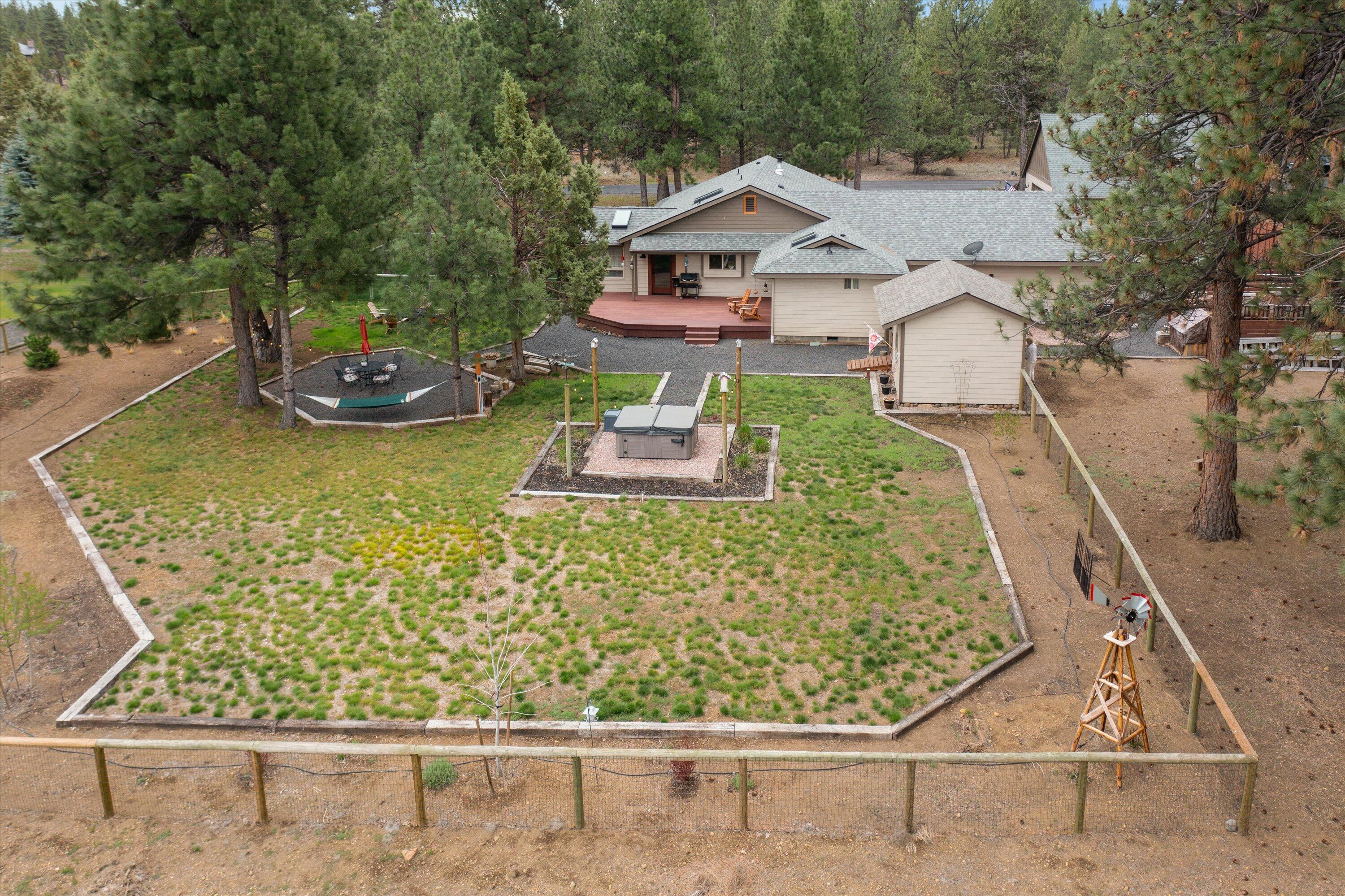 15868 Lundy Road Sisters, OR 97759 - Photo 46 of 53 front view of a house with a yard