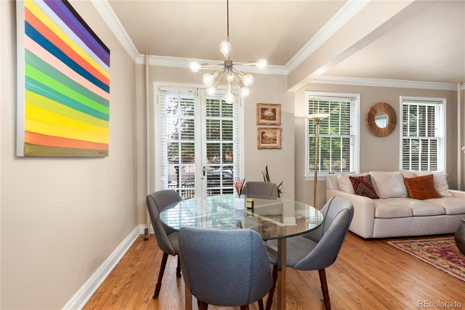 931 Emerson Street, Unit 1 Denver, CO 80218 - Photo 13 of 22 a view of a dining room with furniture window and outside view