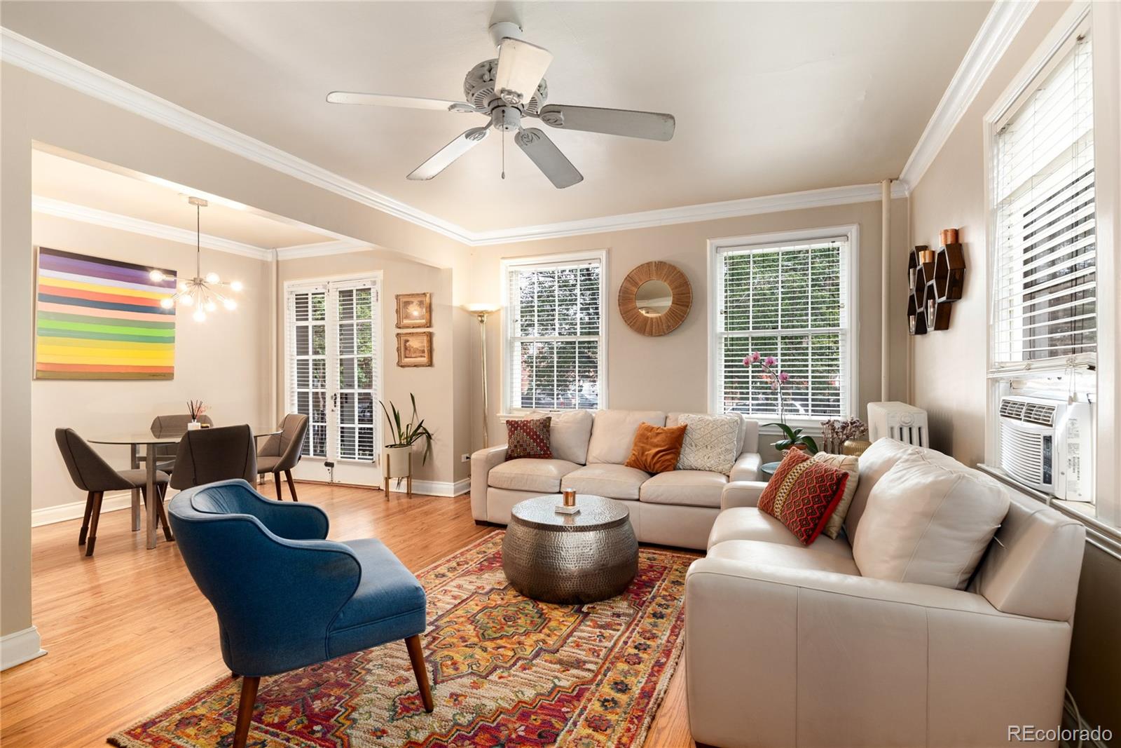 931 Emerson Street, Unit 1 Denver, CO 80218 - Photo 8 of 22 a living room with furniture and a large window