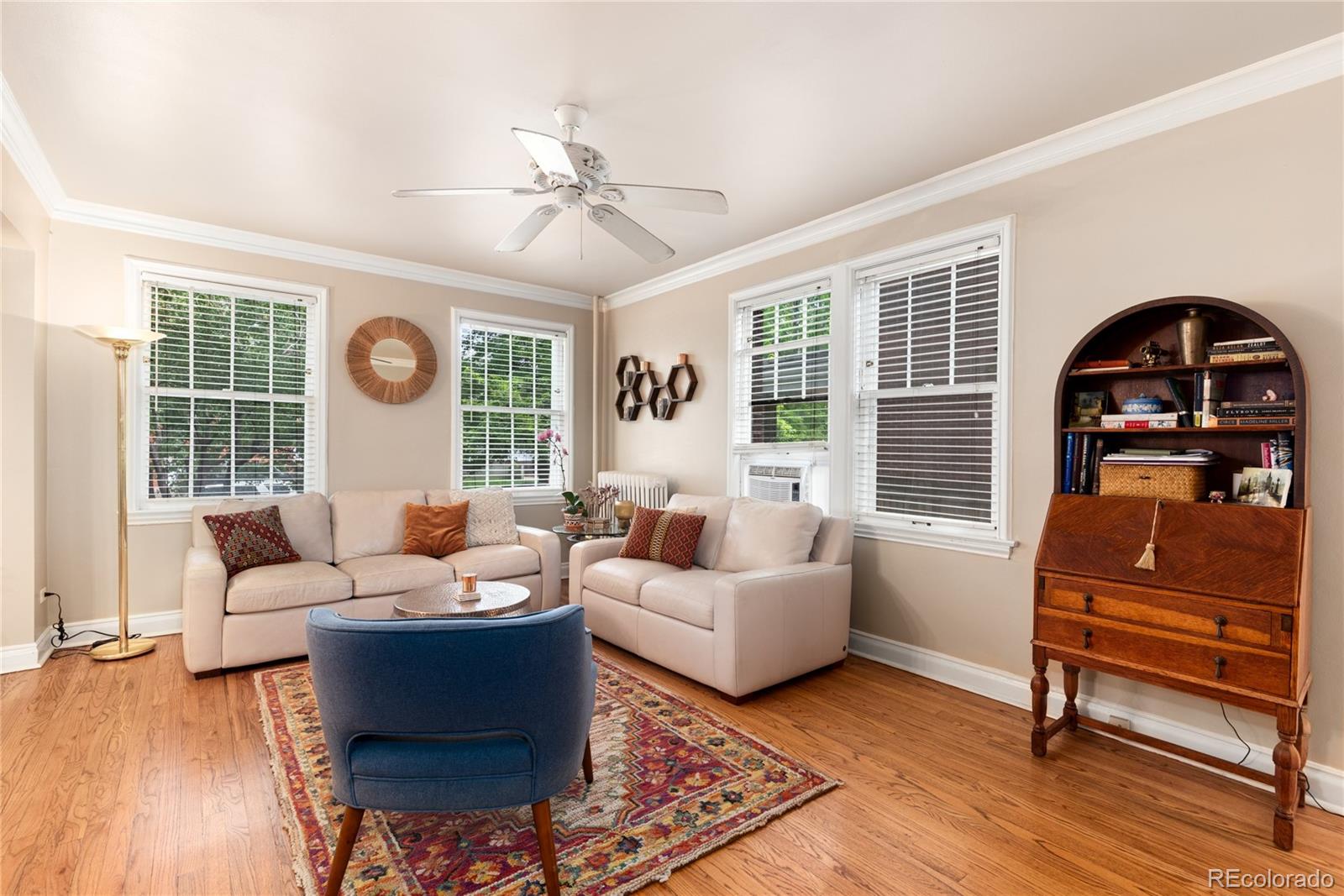931 Emerson Street, Unit 1 Denver, CO 80218 - Photo 9 of 22 a living room with furniture and wooden floor