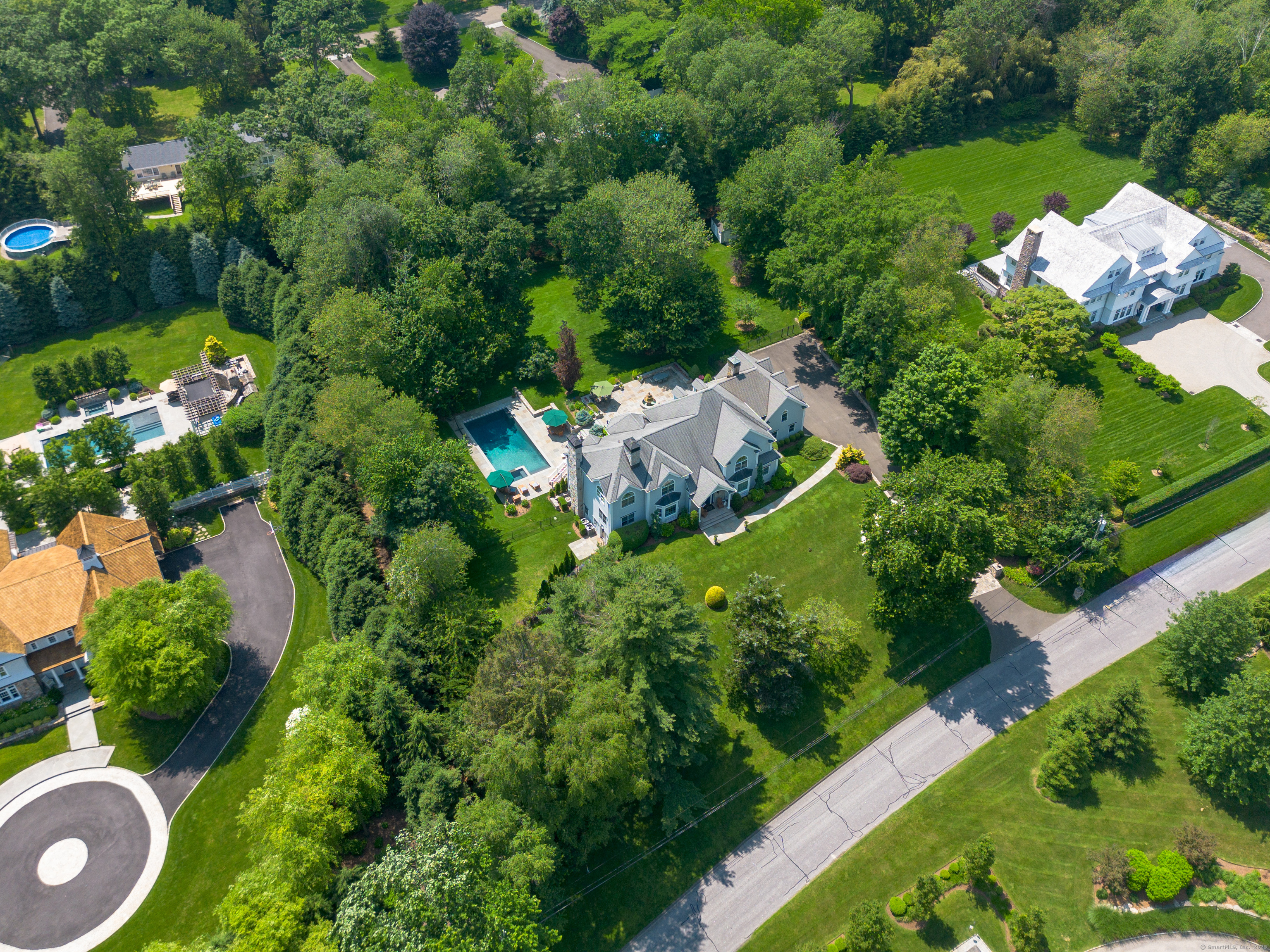 113 Skyview Lane New Canaan, CT 06840 - Photo 2 of 40 an aerial view of a house with yard