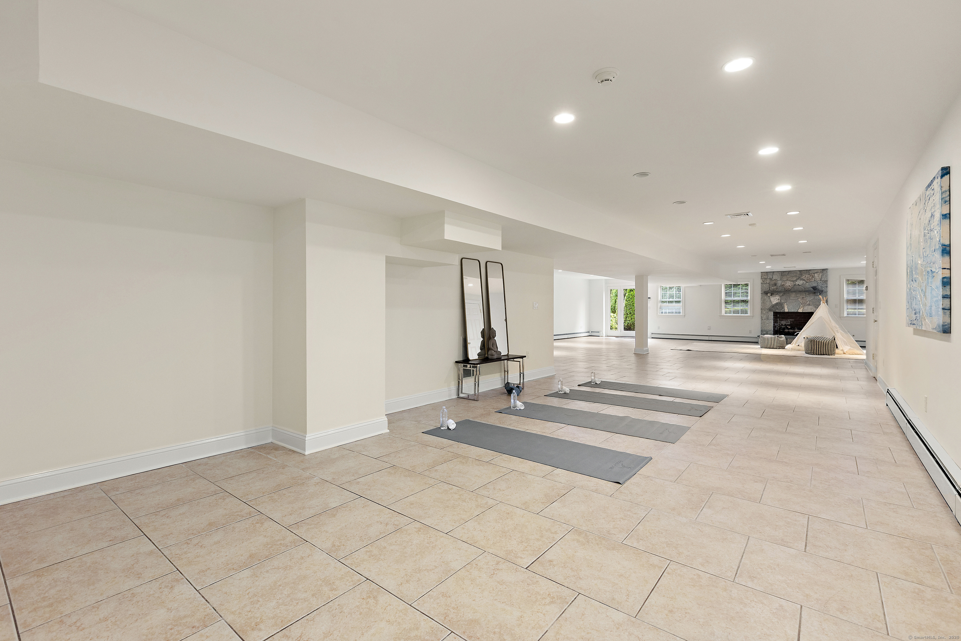 113 Skyview Lane New Canaan, CT 06840 - Photo 28 of 40 a view of a hall with wooden floor