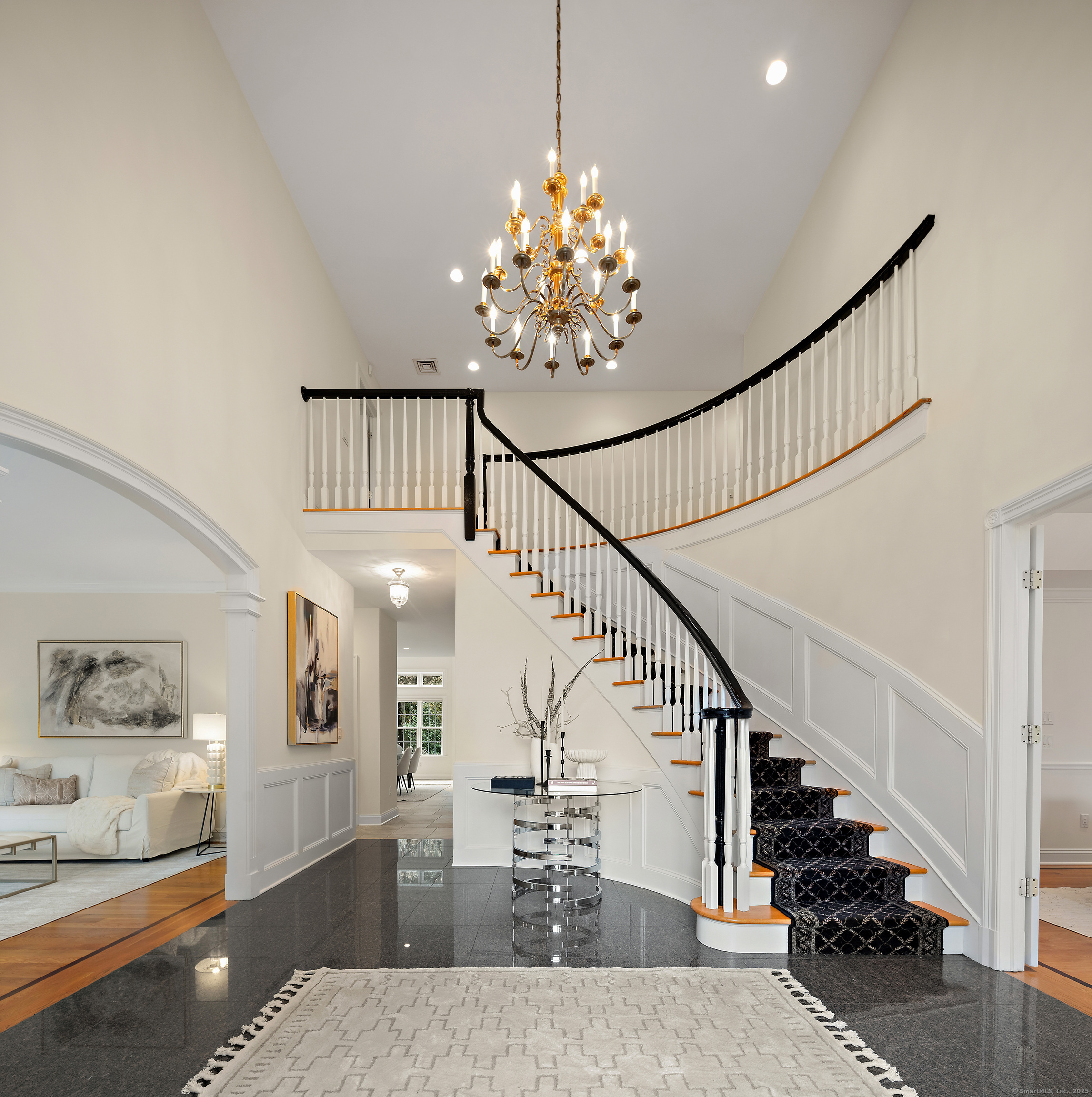 113 Skyview Lane New Canaan, CT 06840 - Photo 5 of 40 a view of entryway and hall with wooden floor
