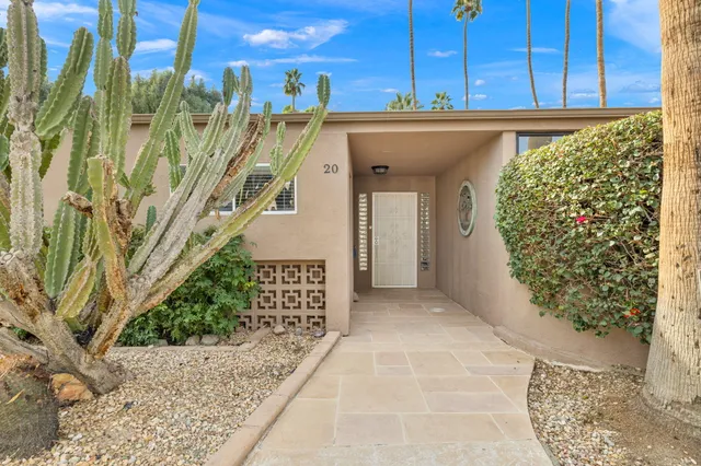 a view of a house with a wooden door