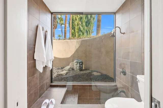 a bathroom with a sink and toilet