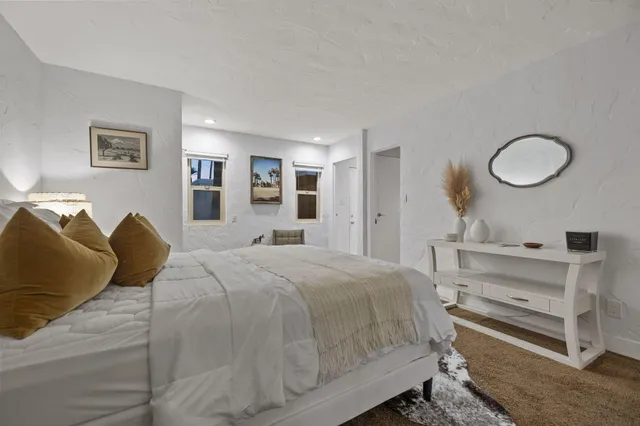 a bed room with a bed and closet