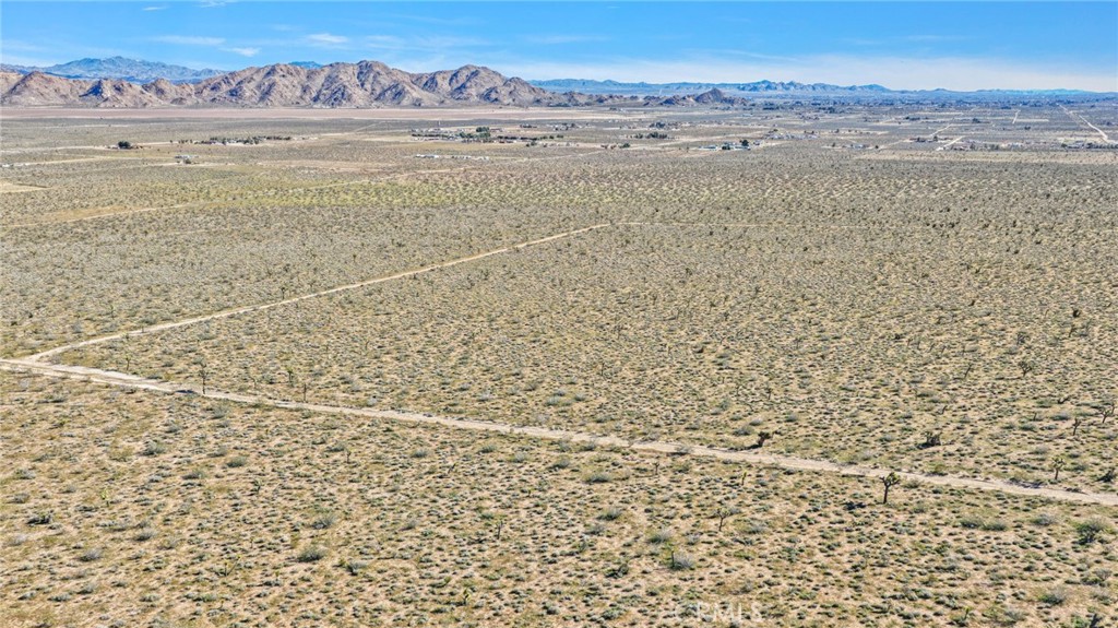 0 Joshua Road Apple Valley, CA 92308 - Photo 6 of 12 a view of a room with an ocean beach