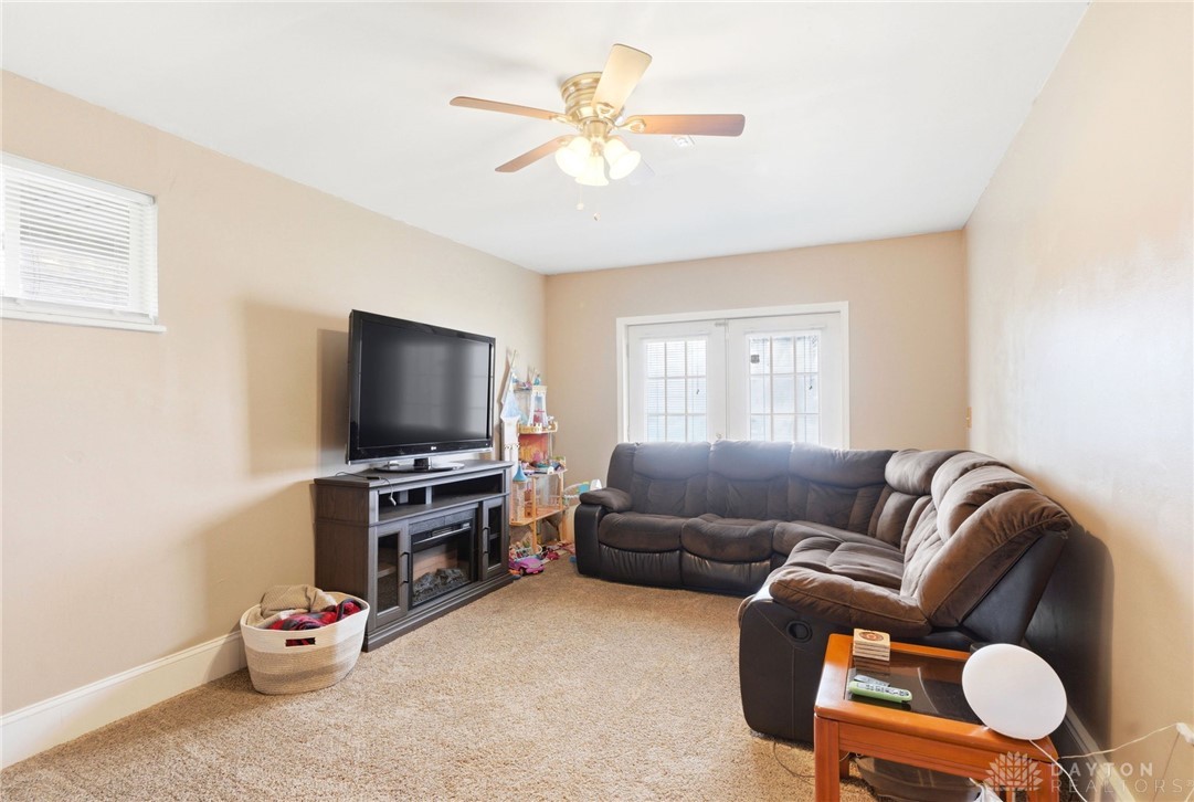5171 Fishburg Road Dayton, OH 45424 - Photo 14 of 35 This inviting living space features warm neutral tones and comfortable carpeting.