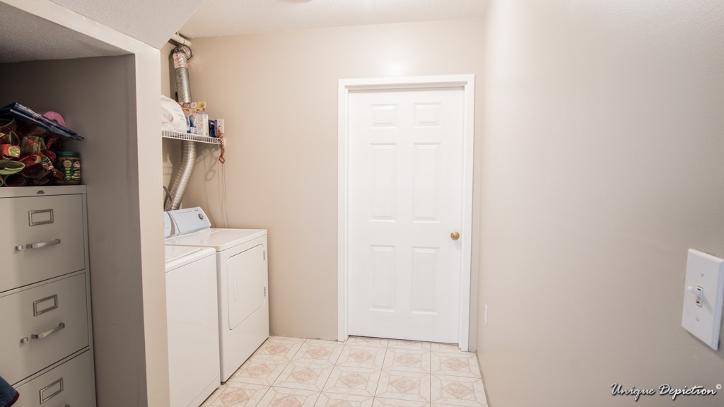 10 Evergreen Way, Unit 10 Peabody, MA 01960 - Photo 20 of 24 a view of hallway with a washer and dryer