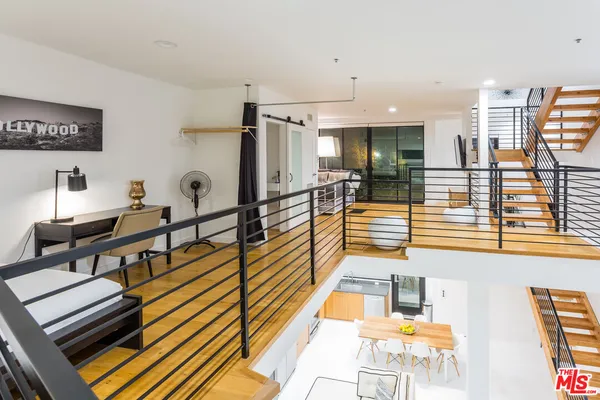 a bedroom with furniture and a pool table