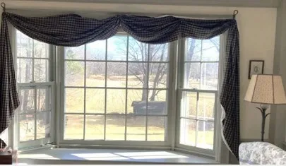 a view of room with window and stairs