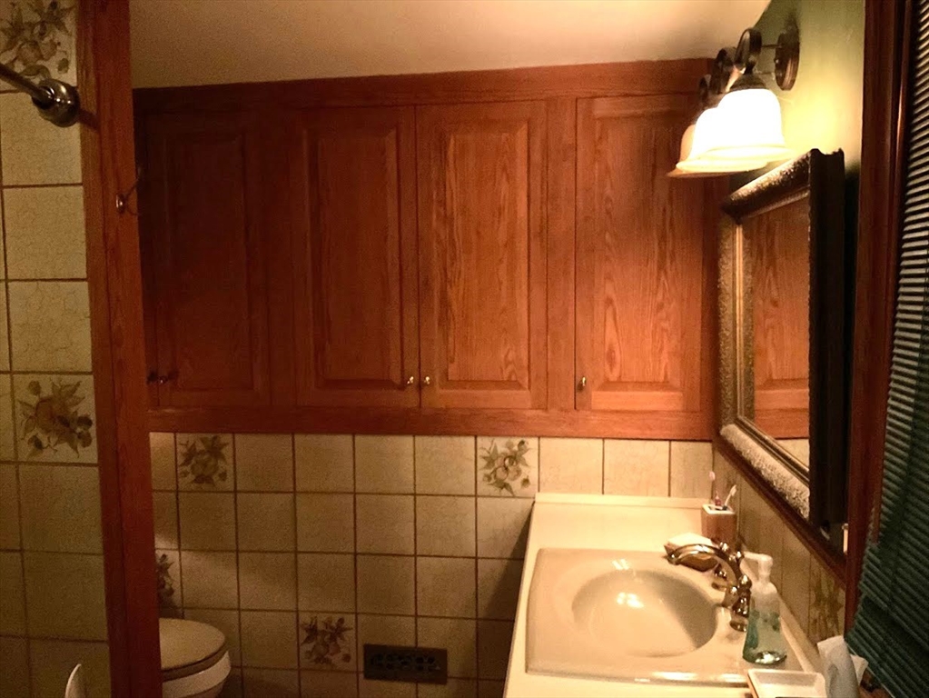 17 South Main Street Petersham, MA 01366 - Photo 15 of 24 a bathroom with a sink and vanity