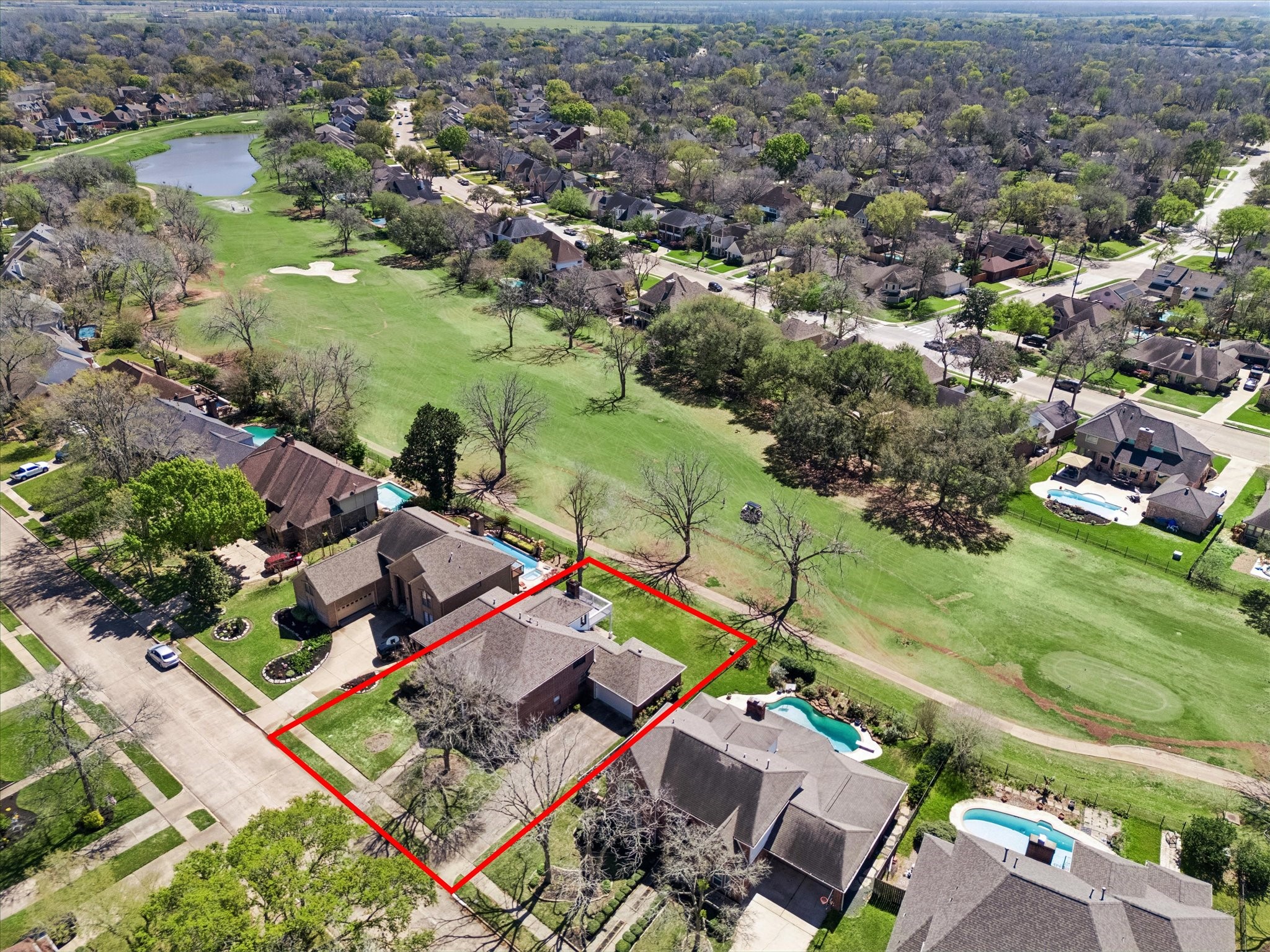 1707 Rambling Stone Drive Richmond, TX 77406 - Photo 1 of 42 an aerial view of residential houses with outdoor space and lake view
