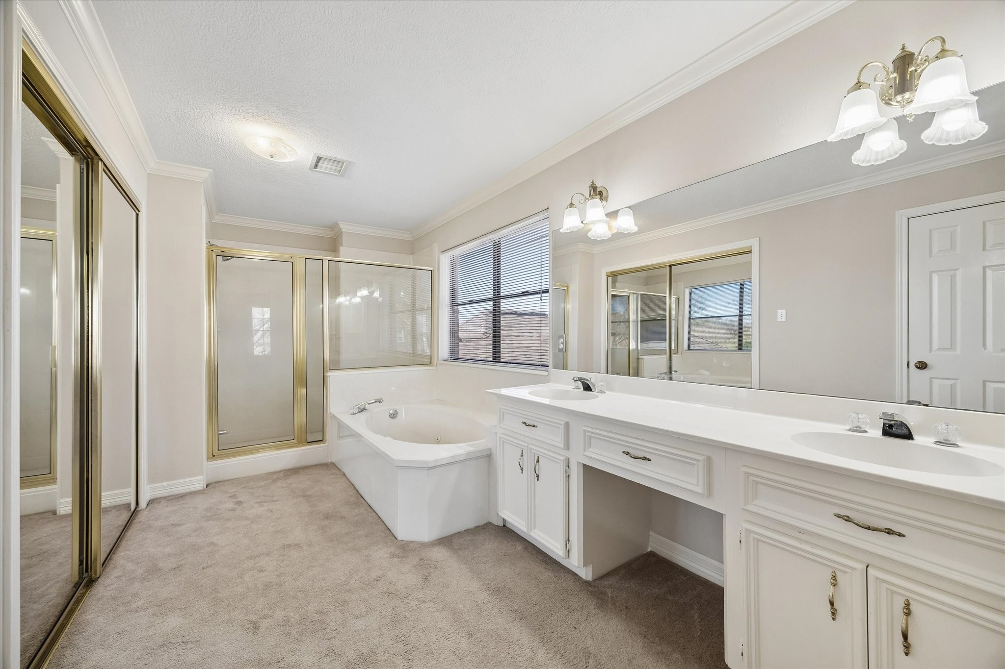 1707 Rambling Stone Drive Richmond, TX 77406 - Photo 27 of 42 EXPANSIVE PRIMARY BATH WITH SOAKING TUB, SEPARATE SHOWER, AND GENEROUS FLOOR SPACE.