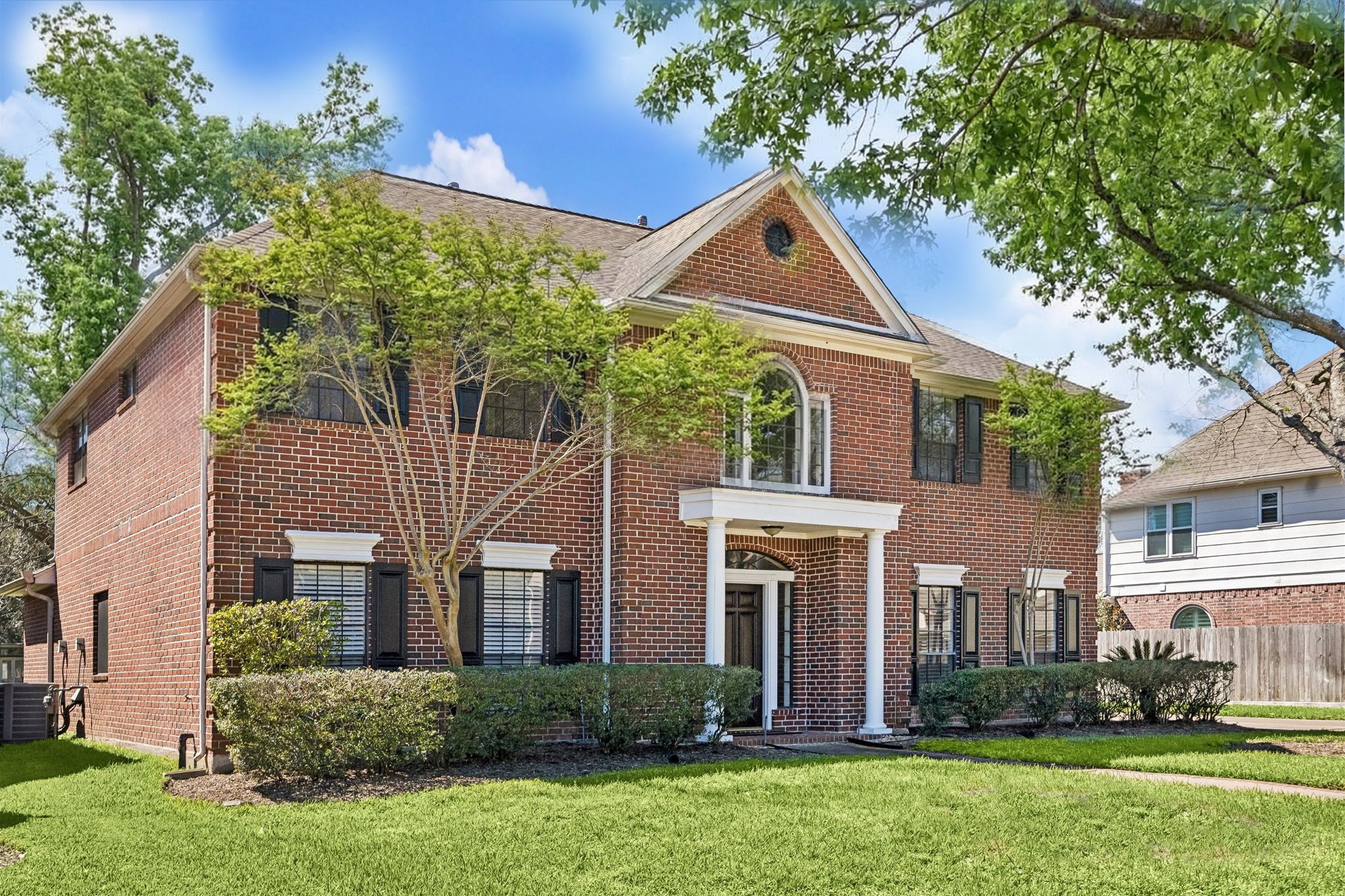 1707 Rambling Stone Drive Richmond, TX 77406 - Photo 4 of 42 a front view of a house with garden